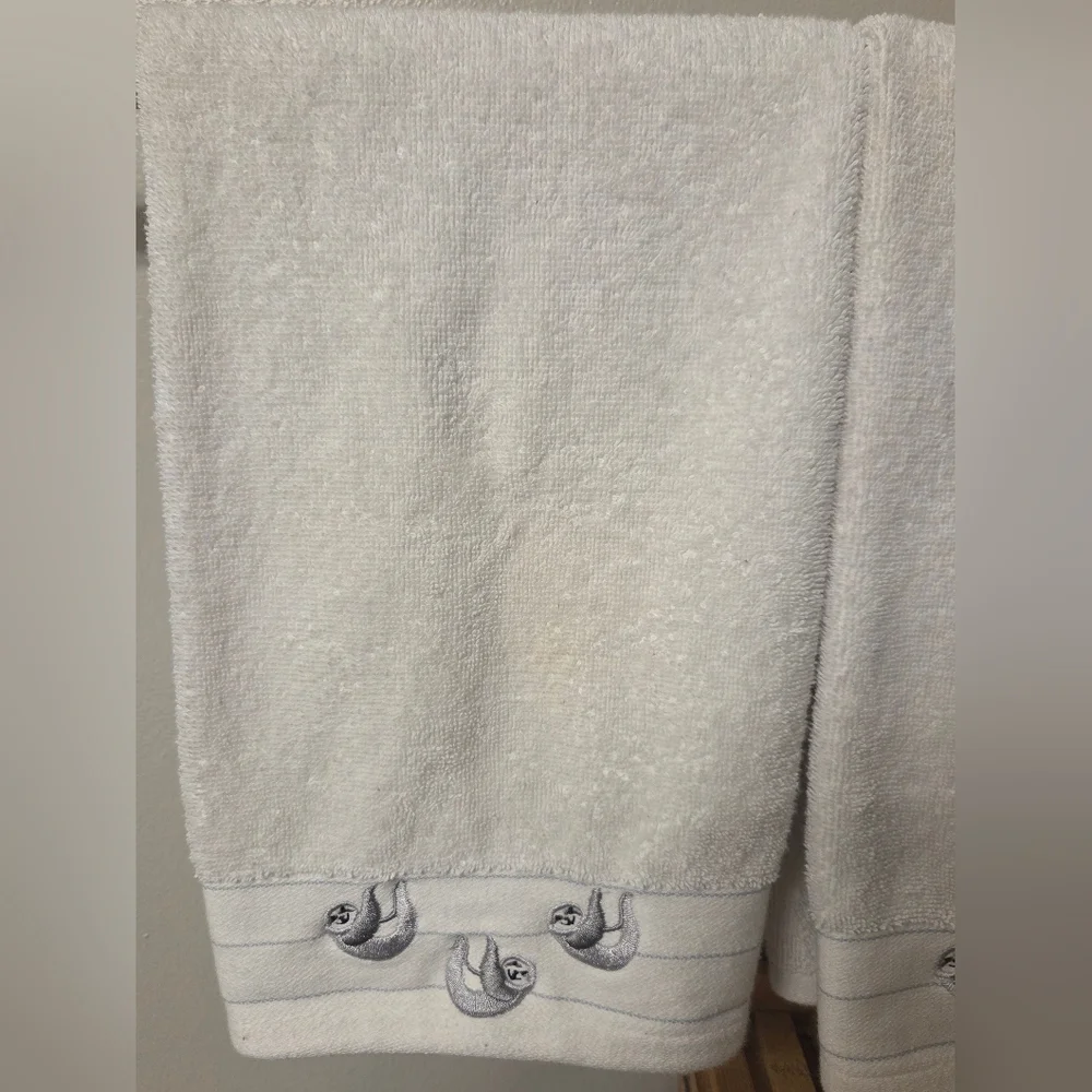 White Hand Towels with Embroidered Sloth Detail